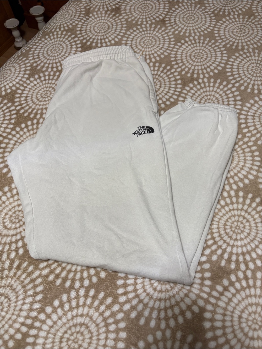 The North Face men’s White Jogger Sweatpants with Logo